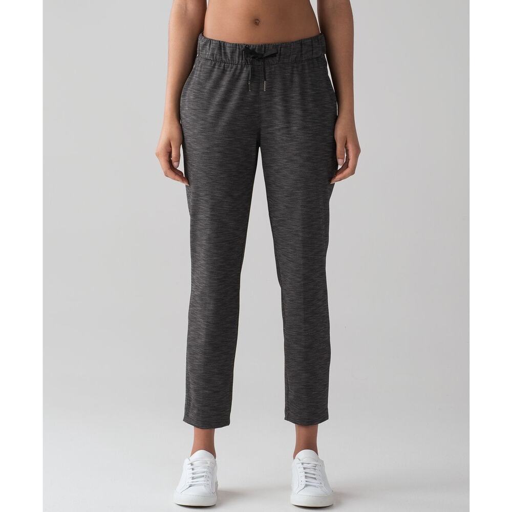 LULULEMON On The Fly Pant (28") Heathered Black Size 4 Pockets Athleisure Travel
